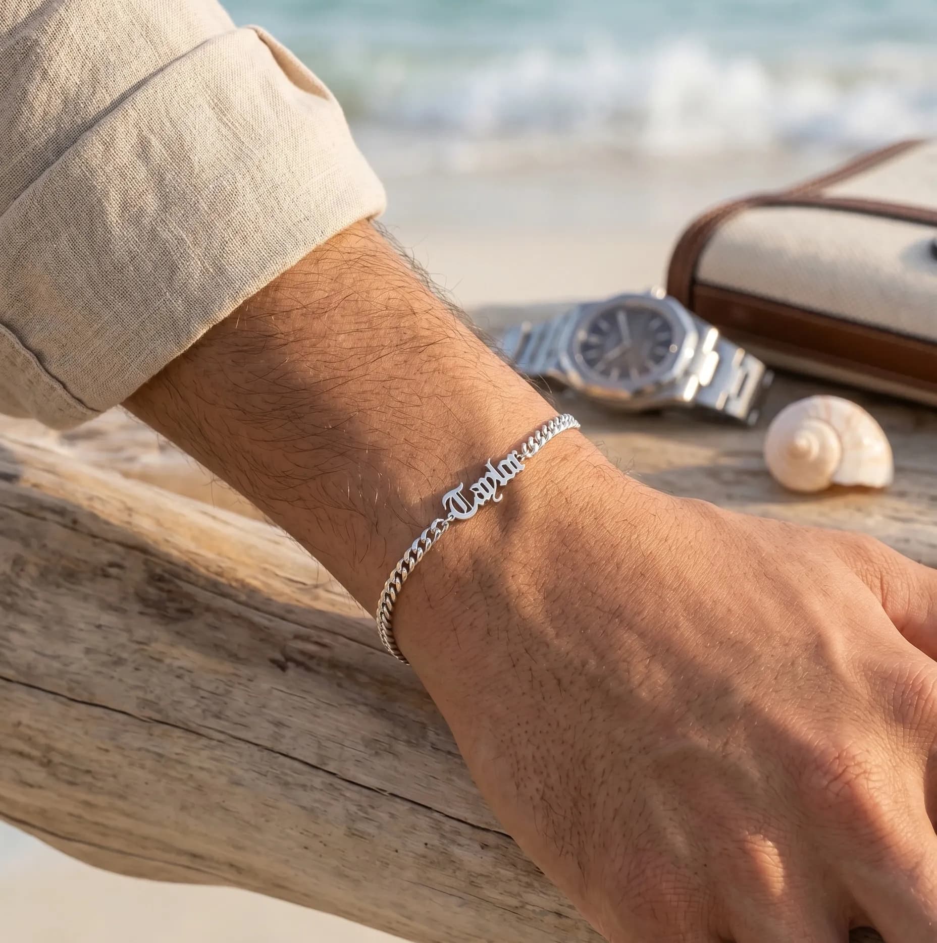 Personalized silver nameplate bracelet on wrist